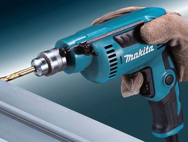 Безударная дрель Makita DP2010