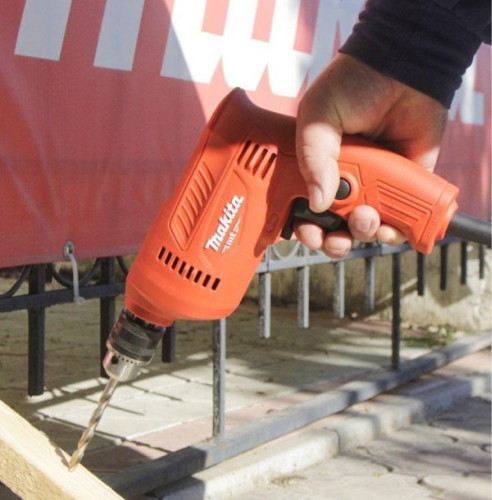 Безударная дрель Makita MT M0600