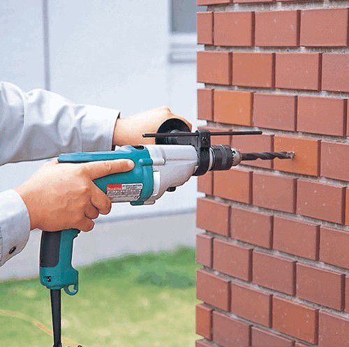 Ударная дрель Makita HP2051FJ (с кейсом MakPac)